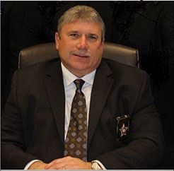 ray cross seated pic